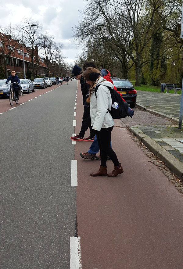 Students measure bike lanes in Delft, Netherlands, during their trip with Kari Watkins' Sustainable Transportation Abroad course. (Photo: Kari Watkins)