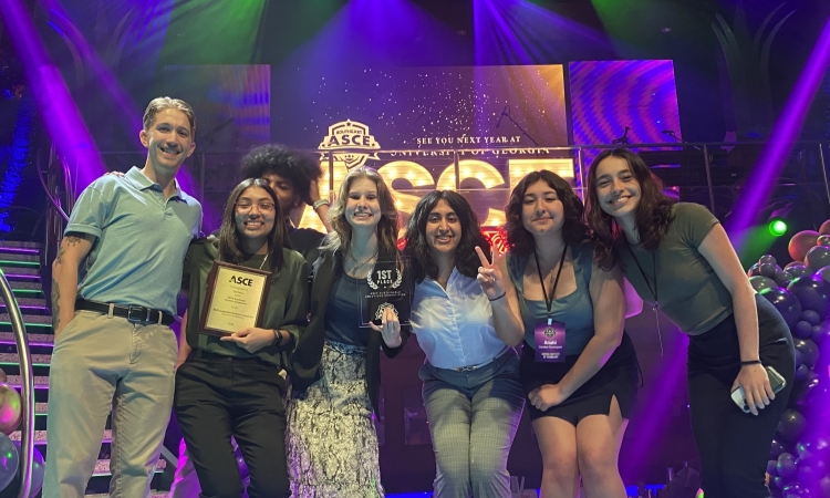 Group of seven students posing with their winning award from ASCE