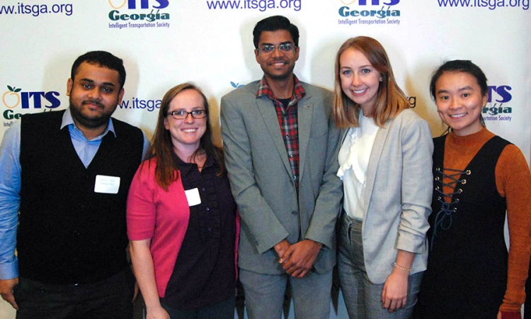 These five School of Civil and Environmental Engineering students won scholarships from the Intelligent Transportation Society of Georgia for their essays about the ways intelligent transportation systems and technology could help the United States eliminate roadway deaths and serious injuries by 2025. From left, Ph.D. students Somdut Roy, April Gadsby and Cibi Pranav; undergraduate Katie Popp; and Ph.D. student Hanyan "Ann" Li. (Photo Courtesy: Intelligent Transportation Society of Georgia)