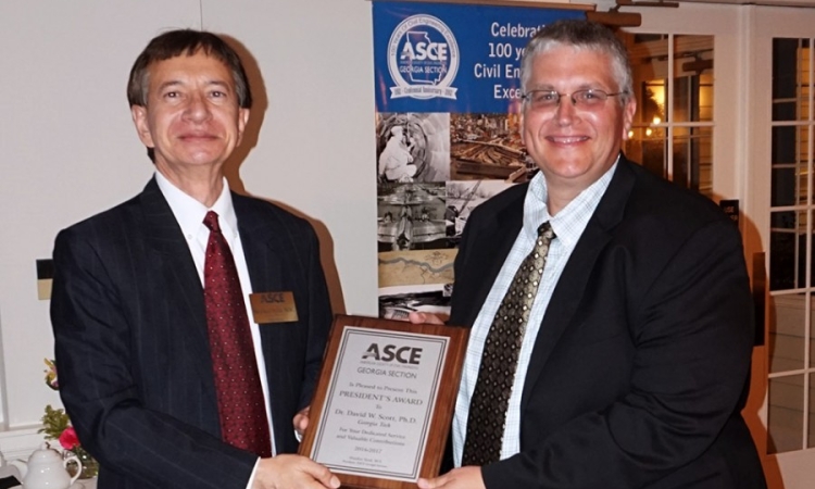 Associate Professor David Scott, right, accepts a President's Award from American Society of Civil Engineers Georgia Section President Shaukat Syed. (Photo Courtesy: John Pierson)