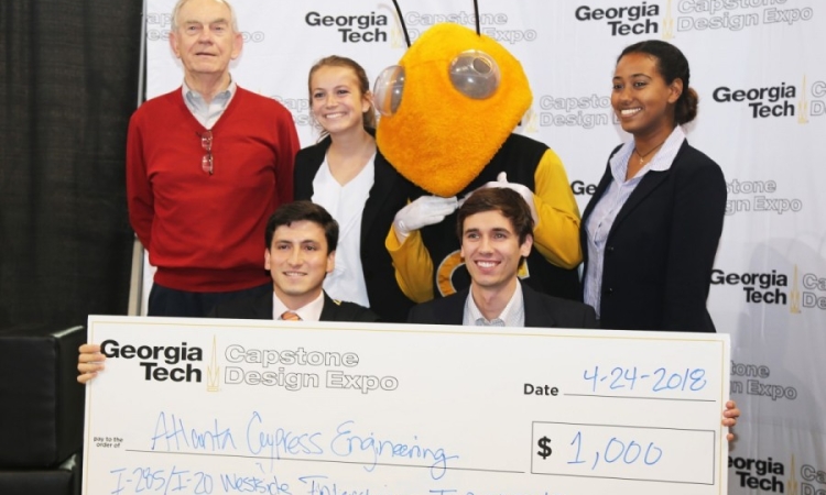 Atlanta Cypress Engineering won the civil and environmental engineering award at the spring 2018 Capstone Design Expo. The team poses with the winning check. From right: Blane Solomon, Andrew Pofahl, Buzz, Alex Hare, and Ramiro Santana along with senior design professor John Koon. (Photo: Jess Hunt-Ralston)