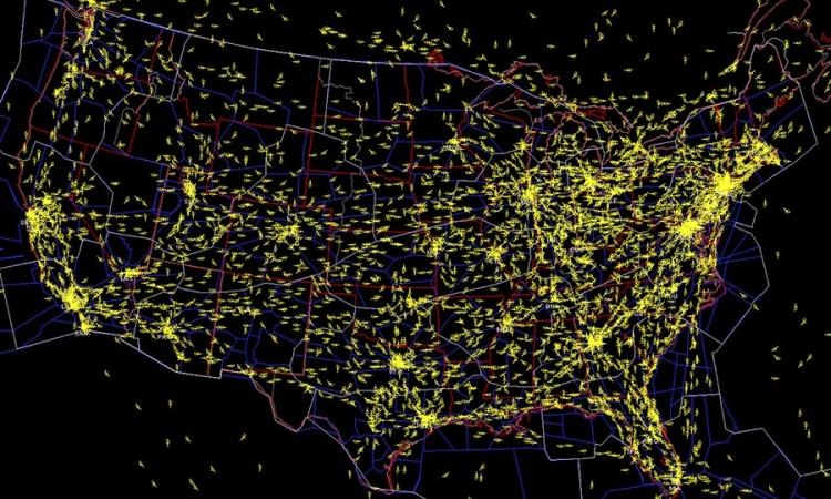 This image from software developed by NASA shows air traffic across the United States. Assistant Professor Sam Coogan has received funding from the U.S. Air Force to use new techniques to understand and manage how physical networks with interconnected components function. His work applies to all kinds of systems, like roads, airspace, water systems and factories. (Image Courtesy: NASA)