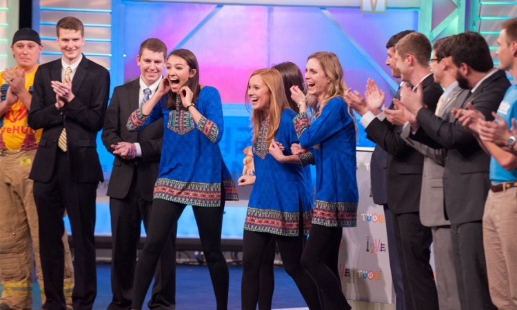 Team TruePani reacts after they're announced as the People's Choice Award winners at the 2016 InVenture Prize finals. The team designed an antimicrobial cup and water storage device that makes drinking water safer. Shannon Evanchec and Samantha Becker have been working full-time for the last year to turn their winning invention into a viable business. (Photo: Fitrah Hamid)