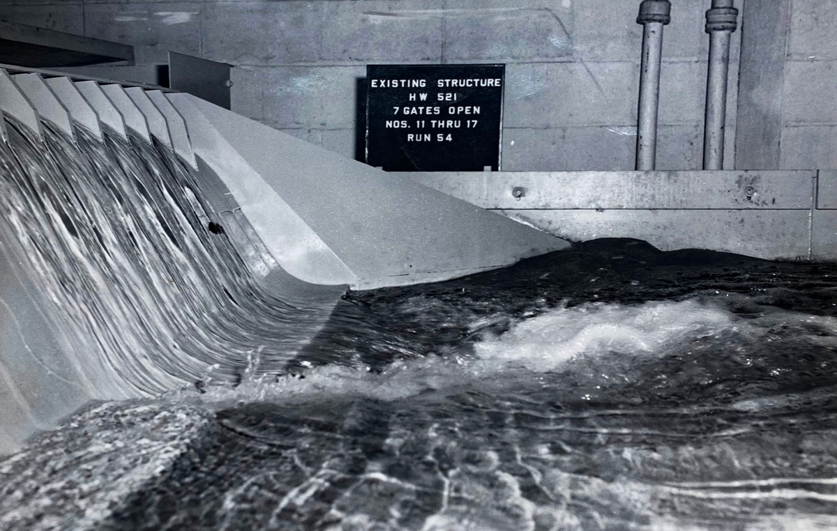 water flowing through a model dam