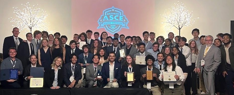 Group of 61 CEE students and three faculty advisors pose with their awards at the final cermeony of the 2025 Southeast ASCE Student Symposium at UGA in Athens