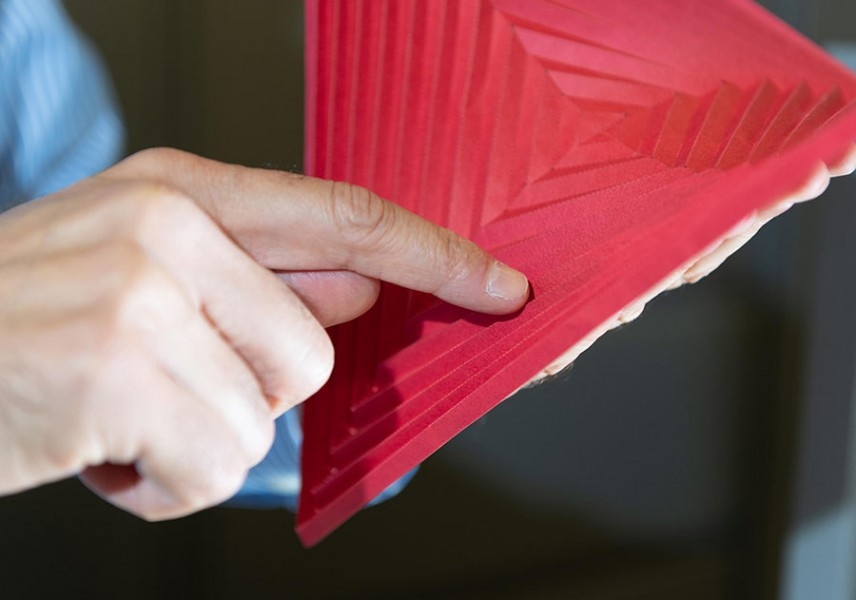 Glaucio Paulino, a professor in the Georgia Tech School of Civil and Environmental Engineering, demonstrates hyperbolic paraboloid origami