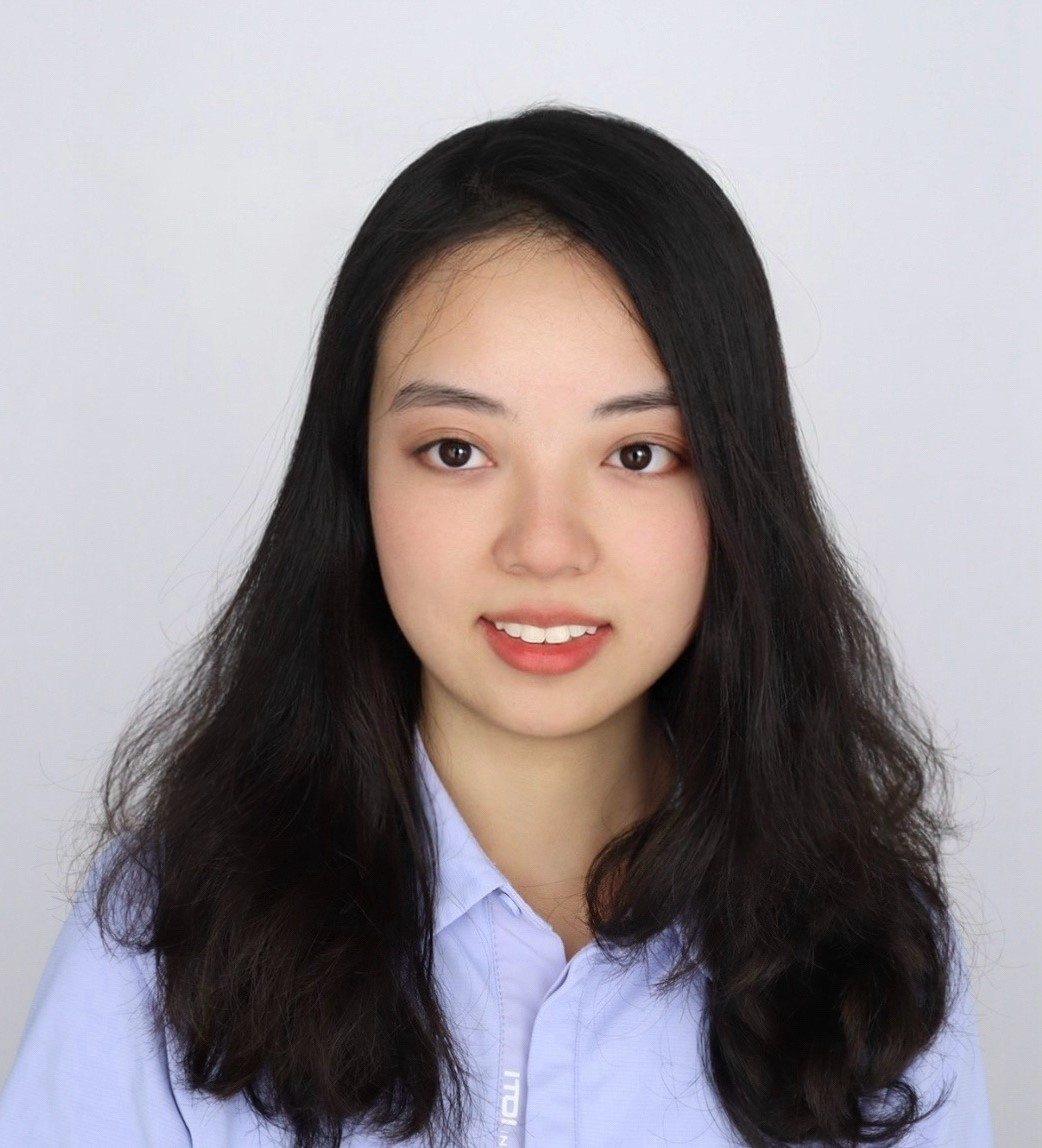 Bingjie Lu wearing a blue oxford shirt