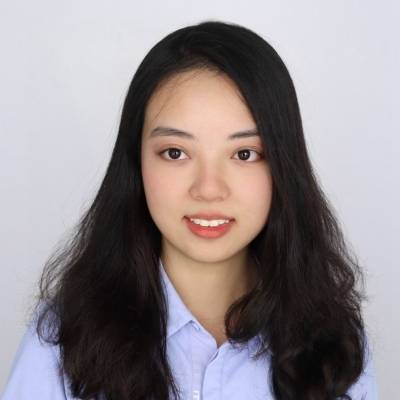 Bingjie Lu wearing a blue oxford shirt